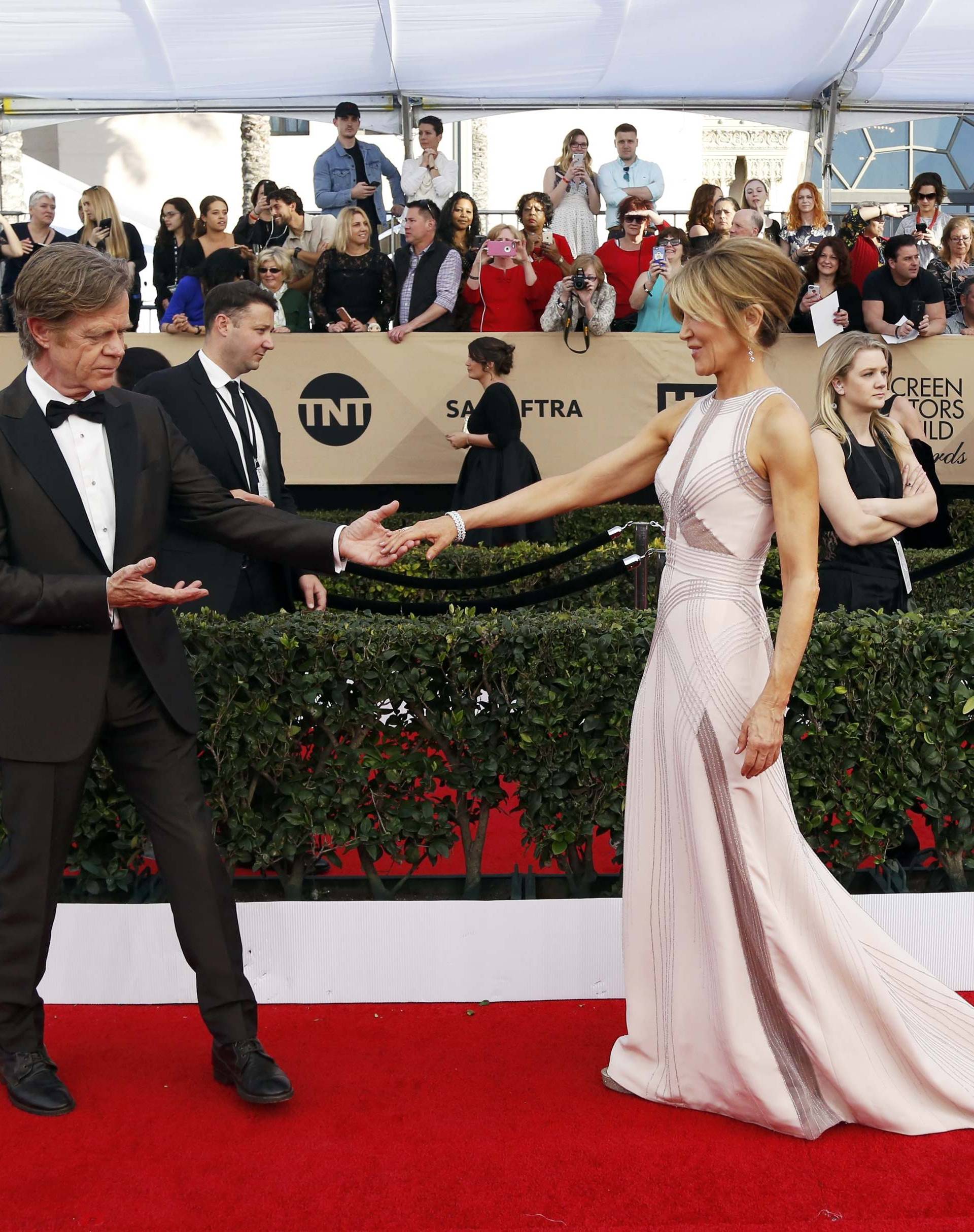 William H. Macy and Felicity Huffman arrive at the 23rd Screen Actors Guild Awards in Los Angeles