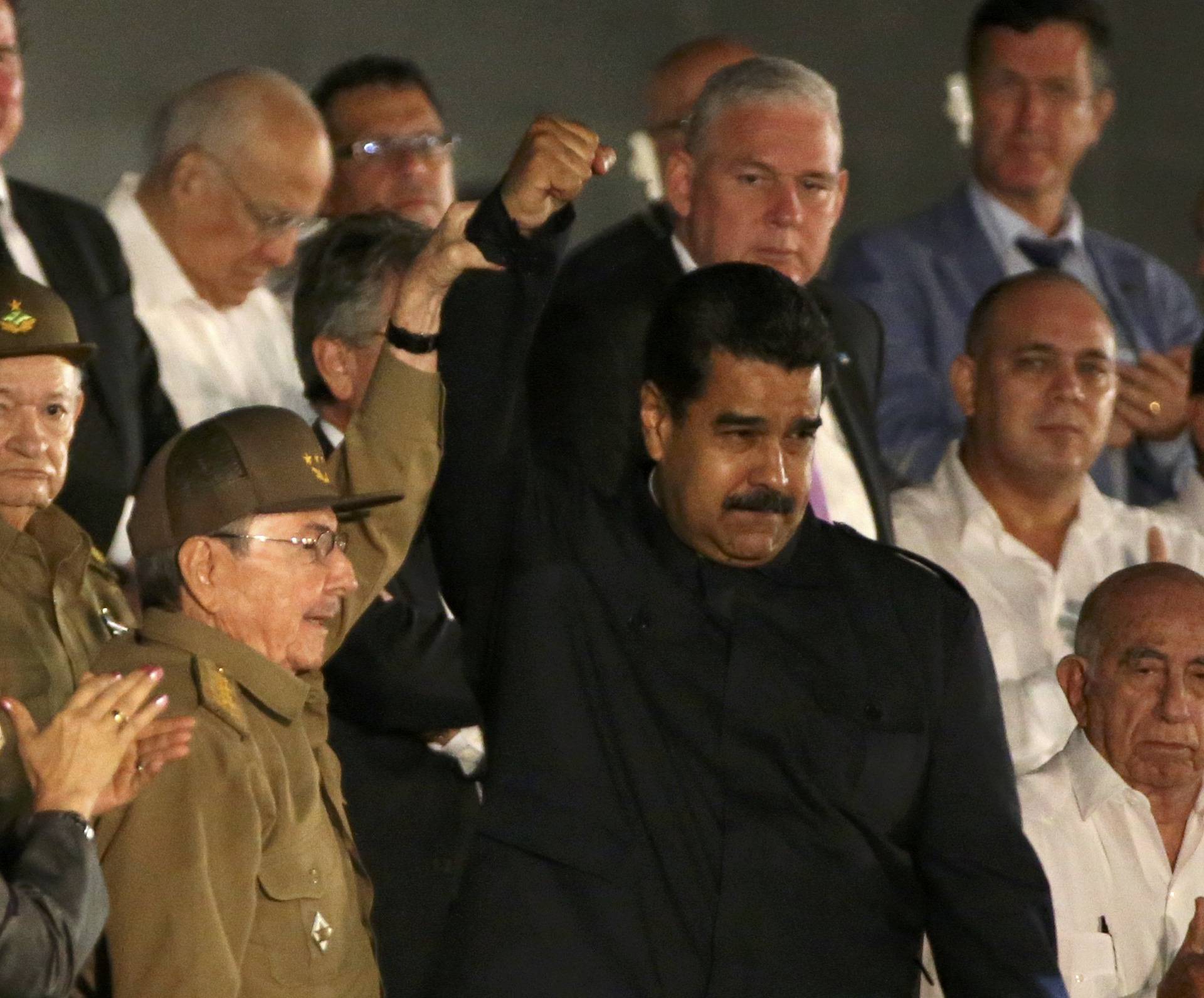 Venezuelan President Nicolas Maduro addresses the crowd at a massive tribute to Cuba's late President Castro in Havana