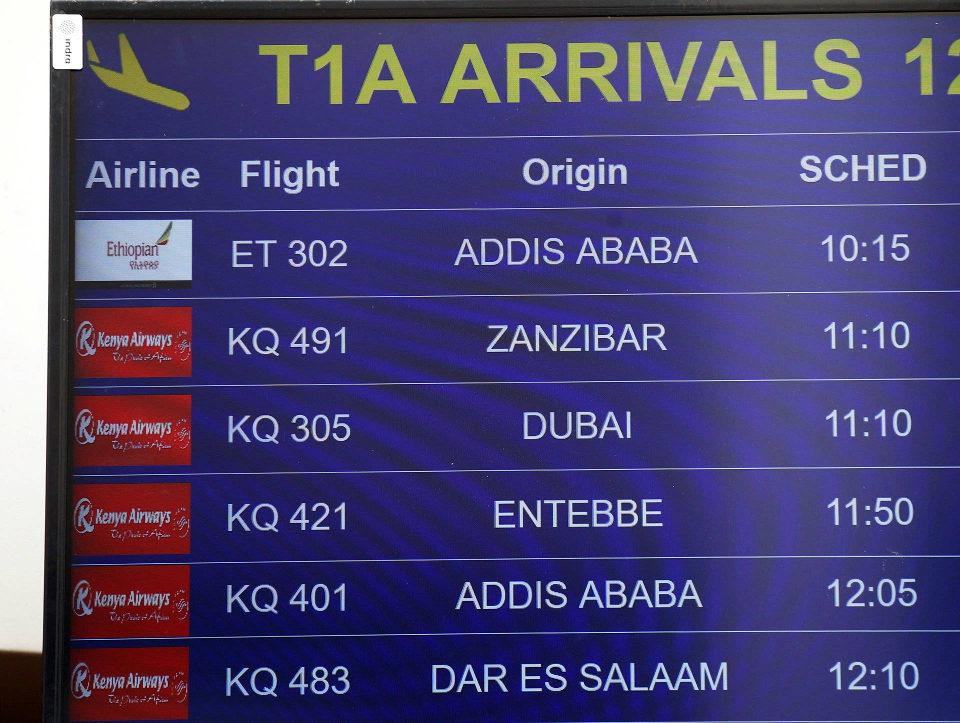 A flight information board displaying the details of Ethiopian Airlines Flight ET 302 is seen at the Jomo Kenyatta International Airport (JKIA) in Nairobi