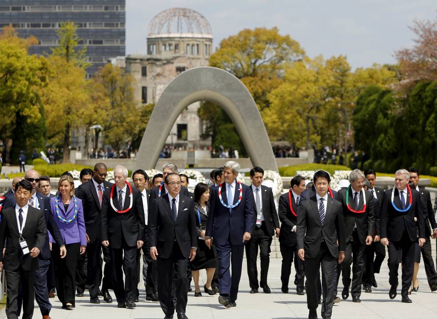 G7 foreign ministers walk together after placing wreaths at the cenotaph at Hiroshima Peace Memorial Park and Museum in Hiroshima, Japan