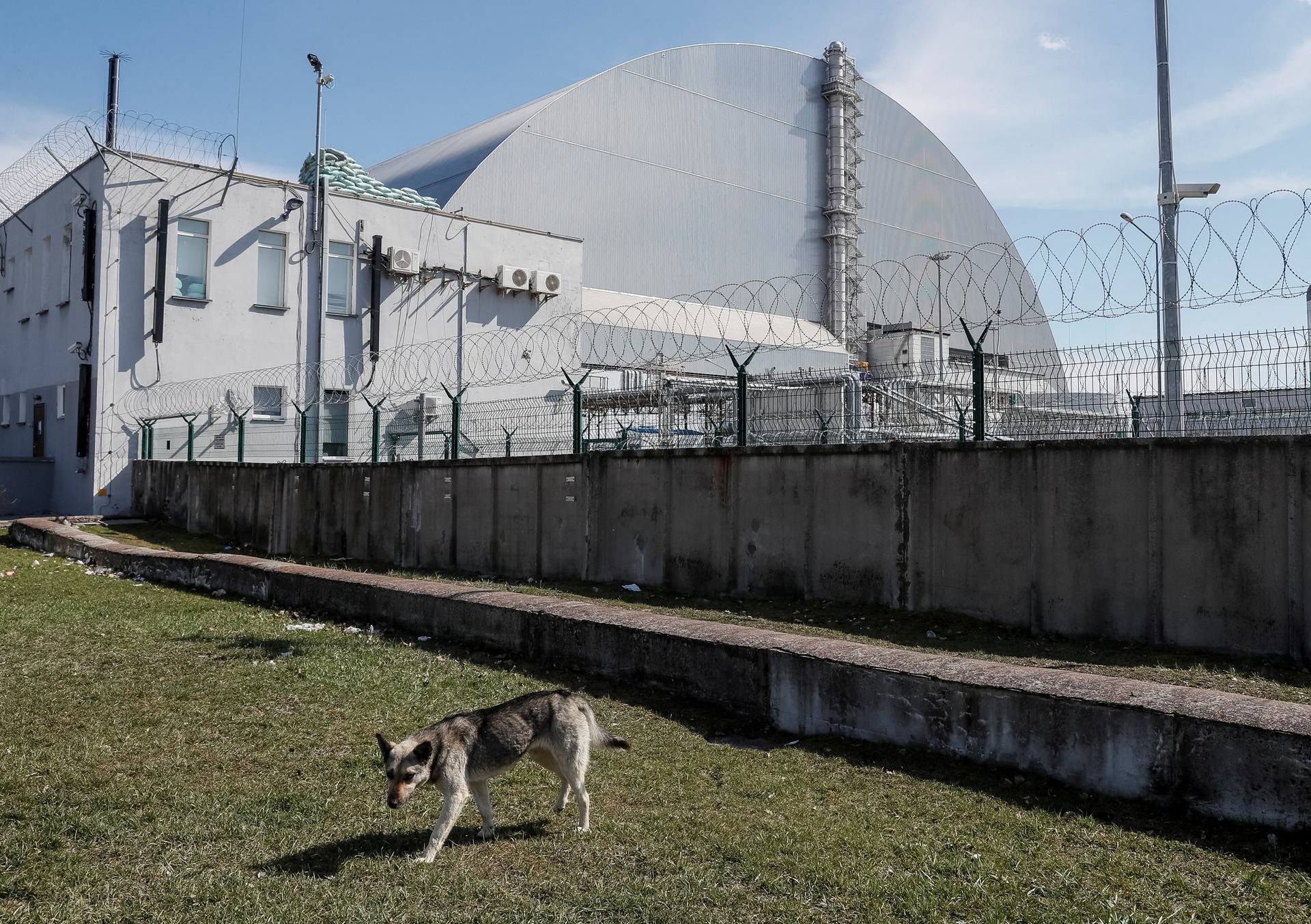 General view of the New Safe Confinement structure over the old sarcophagus covering the damaged fourth reactor at the Chernobyl Nuclear Power Plant, in Chernobyl
