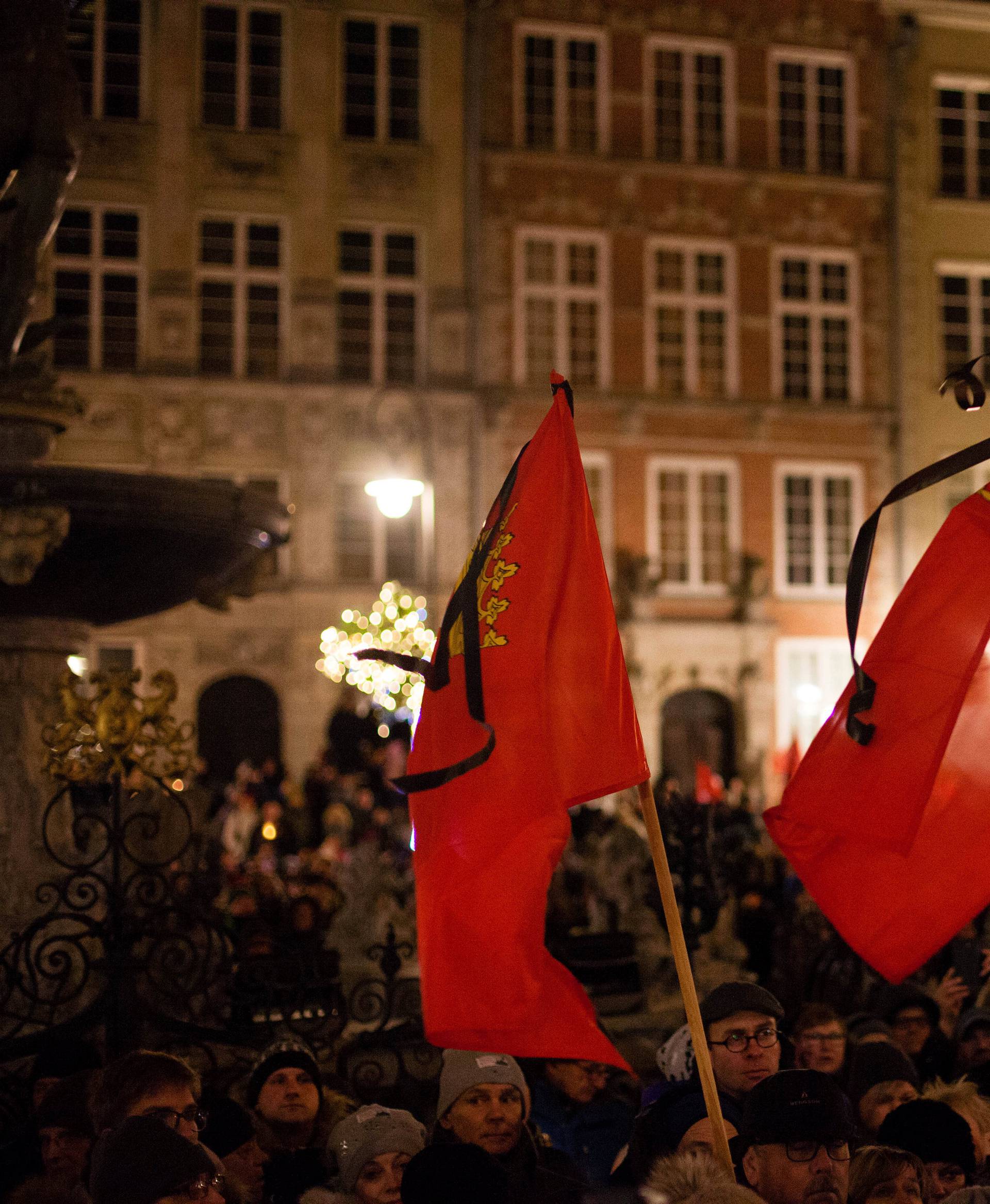 People march against violence and hatred in the wake of a deadly attack on Gdansk Major Pawel Adamowicz, who was stabbed in Gdansk on stage of a public charity event, in Gdansk