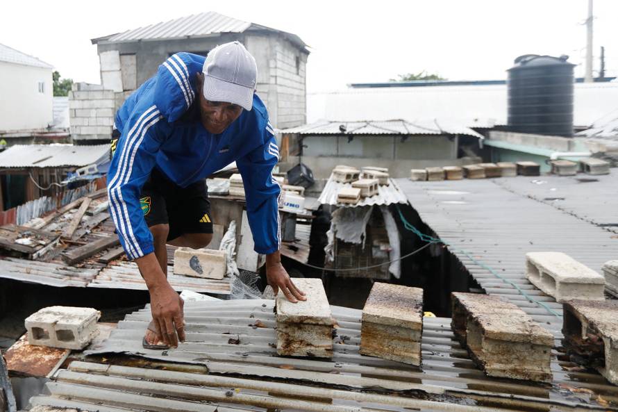Jamaicans make preparations ahead of the arrival of Hurricane Melissa