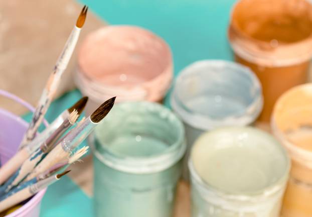 children learn to paint ceramics from the festival in Ukraine