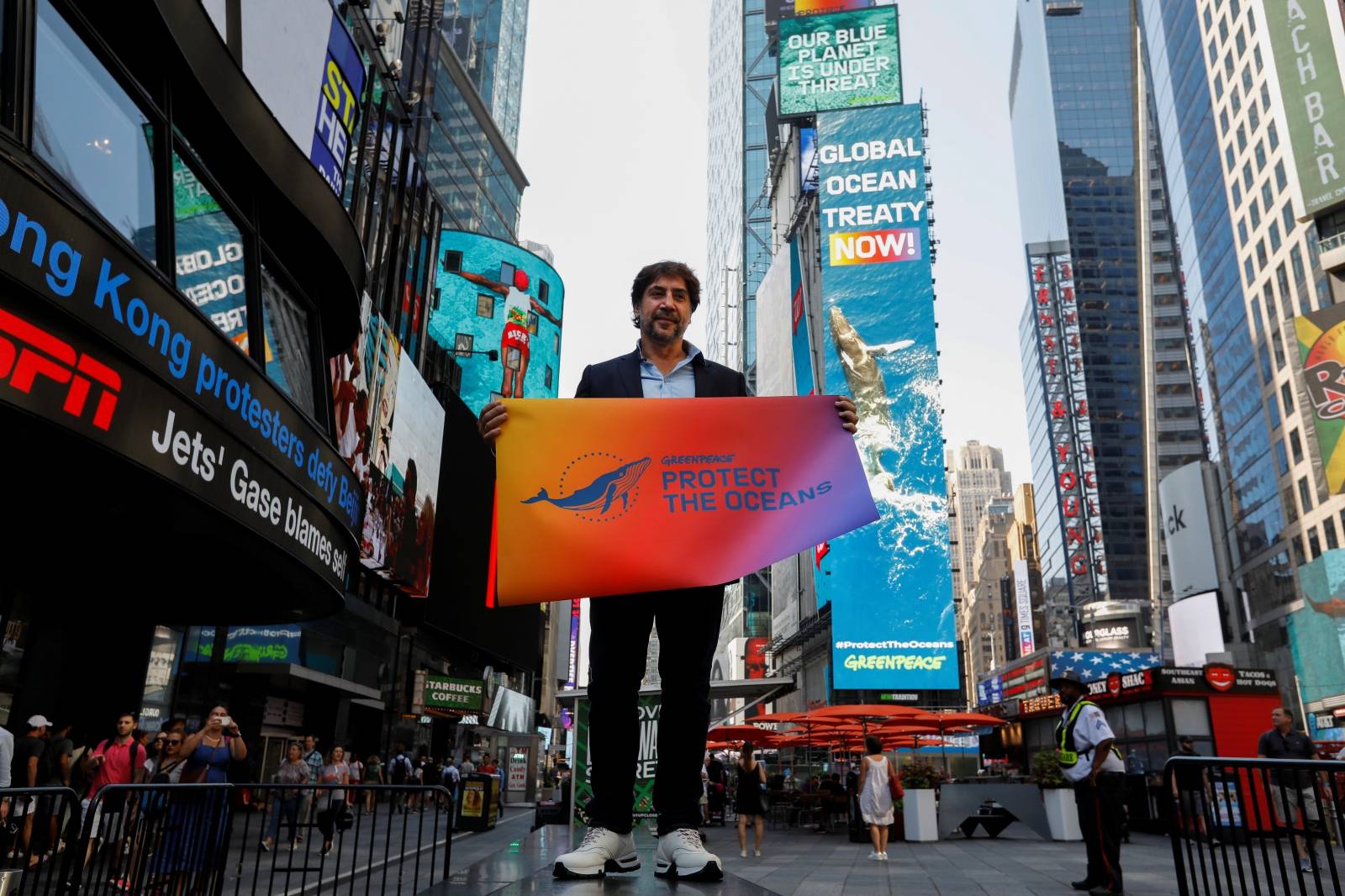 Actor Javier Bardem poses in Times Square ahead of speaking at a United Nations conference on ocean conservation in New York