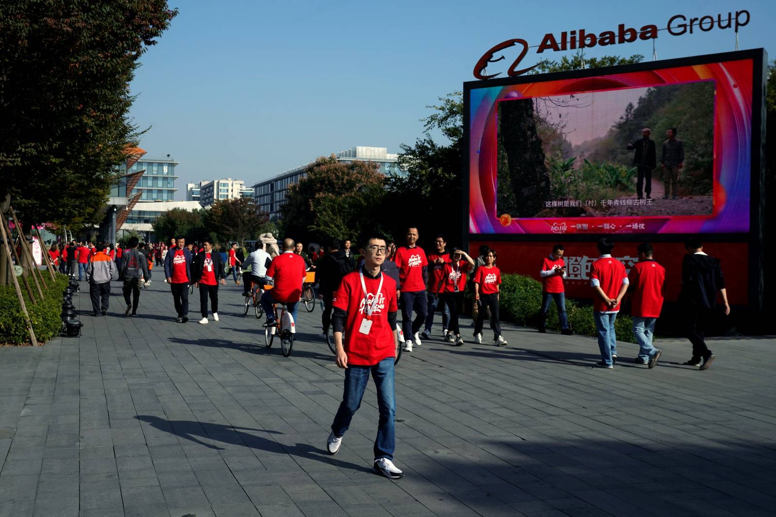 Employees of Alibaba walk during Alibaba Group's 11.11 Singles' Day global shopping festival at the company's headquarters in Hangzhou
