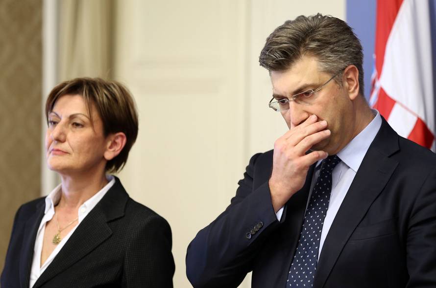 Croatia's Prime Minister Andrej Plenkovic and Martina Dalic, Minister of Economy, attend a news conference in a government building in Zagreb