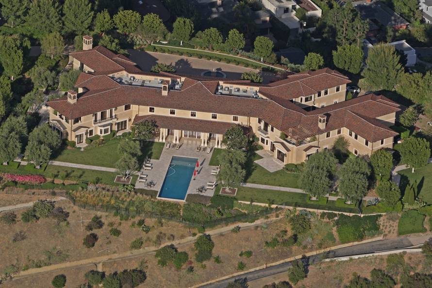 Prince Harry and Meghan Markle have reportedly been staying in an ultra-luxury Beverly Hills mansion that belongs to Tyler Perry, . Perry's eight-bedroom, 12-bathroom Tuscan-style villa sits on the top of a hill in the exclusive Beverly Ridge Estates gate
