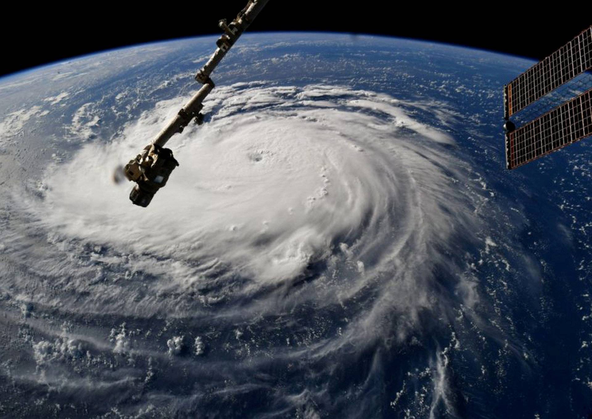 FILE PHOTO: NASA handout photo of Hurricane Florence churning in the Atlantic Ocean towards the east coast of the United States