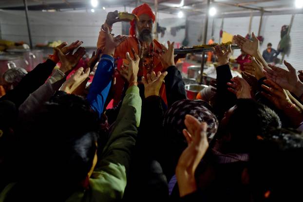 The arrival of the members of an akhara or sect of sadhus for the upcoming "Maha Kumbh Mela" in Prayagraj