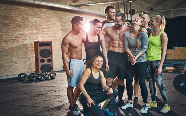 Group,Of,Eight,Happy,Muscular,Female,And,Male,Adults,Standing