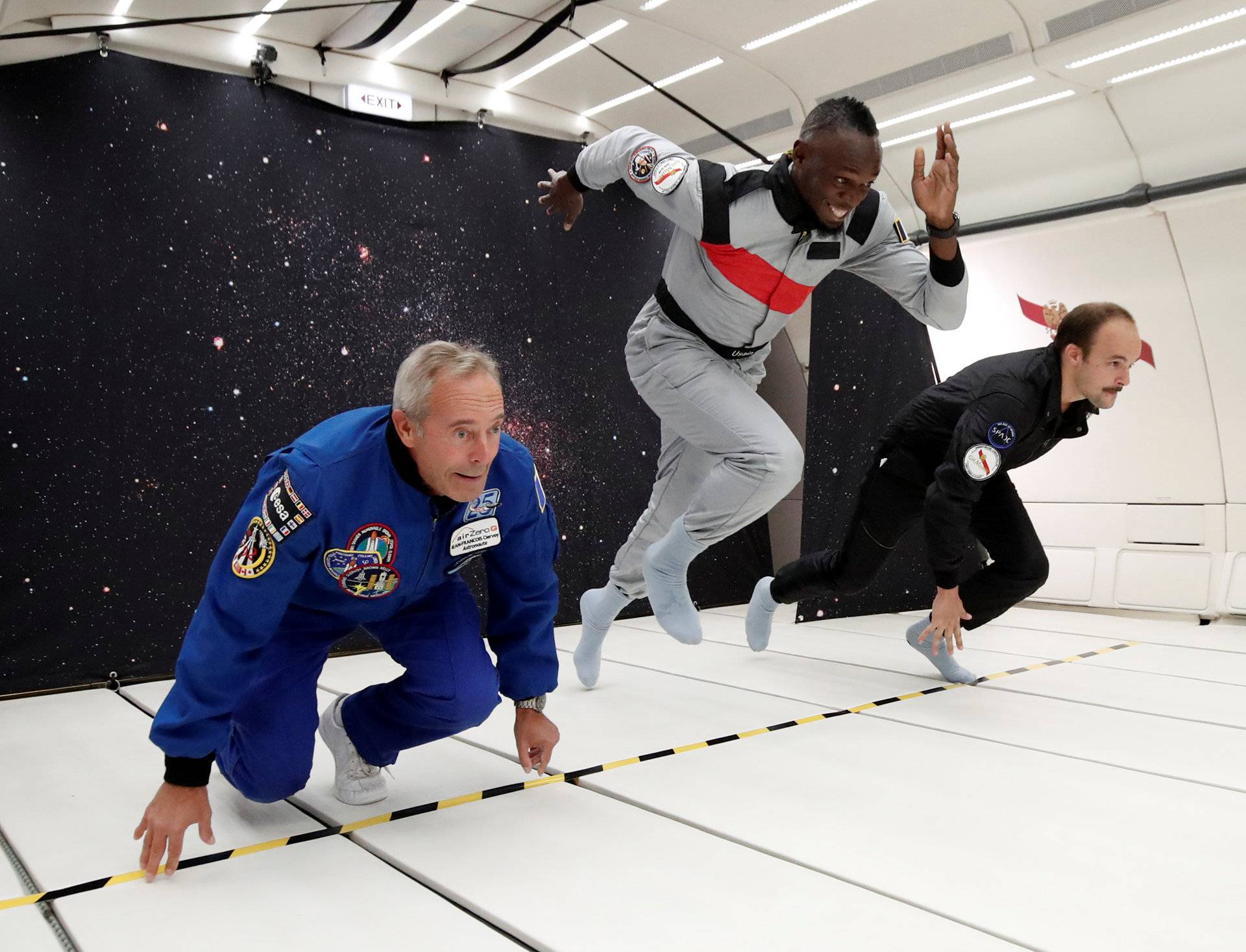 Retired sprinter Usain Bolt, French astronaut Jean-Francois Clervoy and French Interior designer Octave de Gaulle enjoy zero gravity conditions during a flight in a specially modified plane above Reims