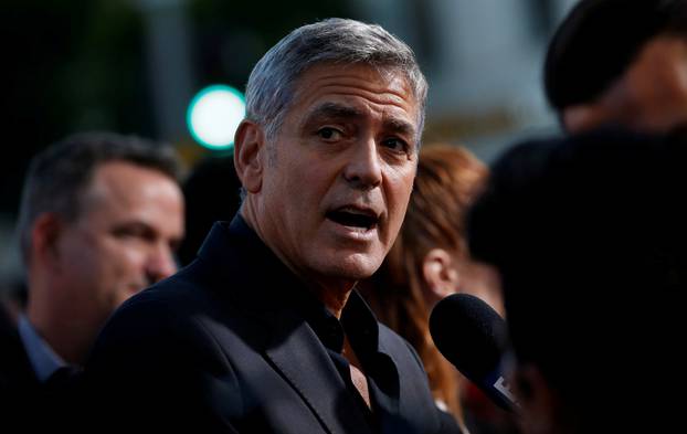 FILE PHOTO: Director Clooney is interviewed at the premiere for "Suburbicon" in Los Angeles