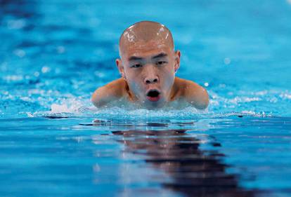 FOTO Kineski torpedo! Plivač bez ruku oduševio svijet i osvojio pet medalja u Parizu