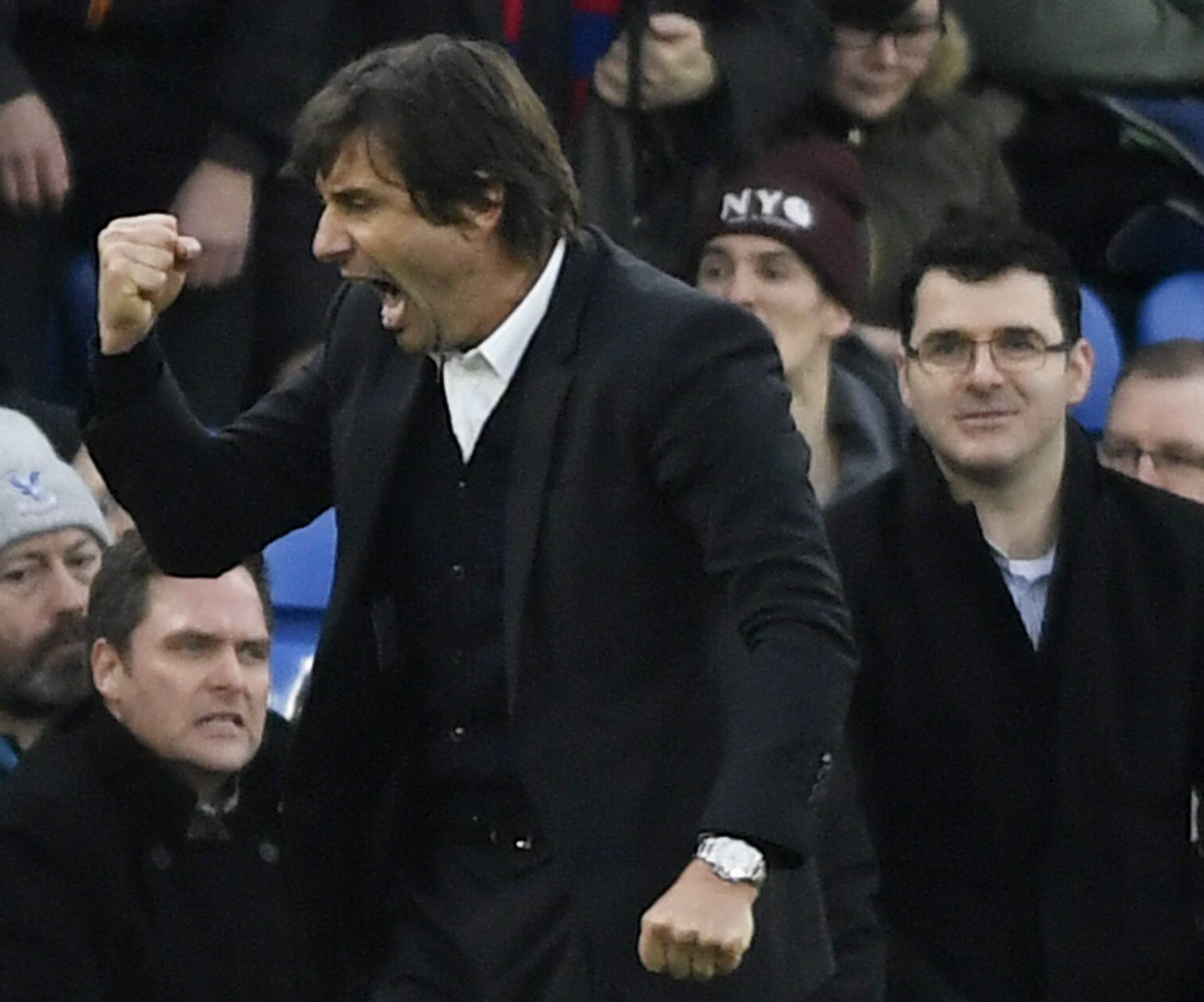 Chelsea manager Antonio Conte celebrates after the game