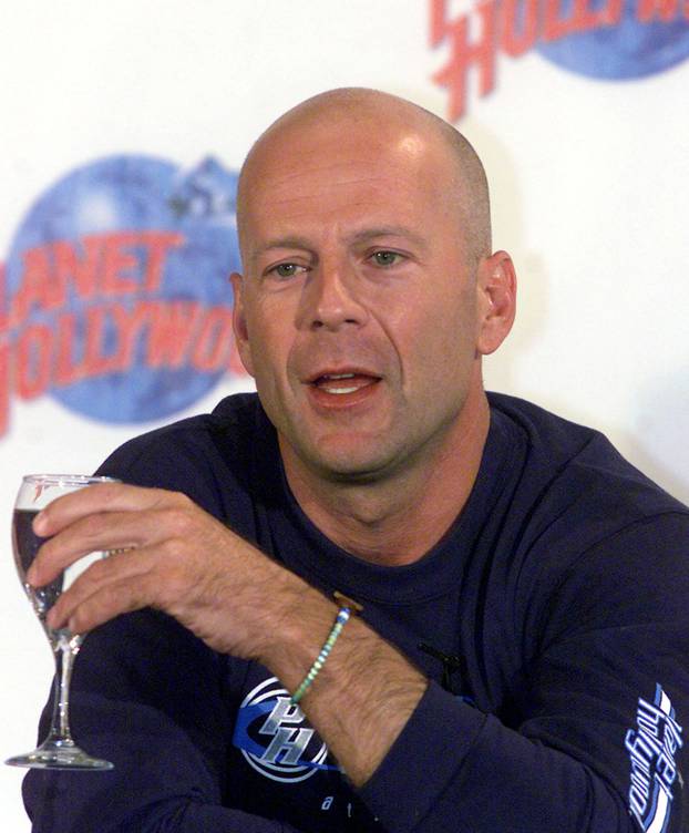 FILE PHOTO: ACTOR BRUCE WILLIS TALKS TO REPORTERS IN ATHENS.
