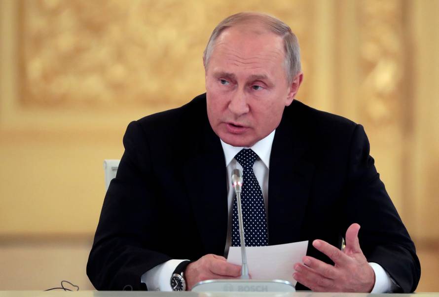 Russian President Putin speaks during a meeting with Italian businessmen in Moscow