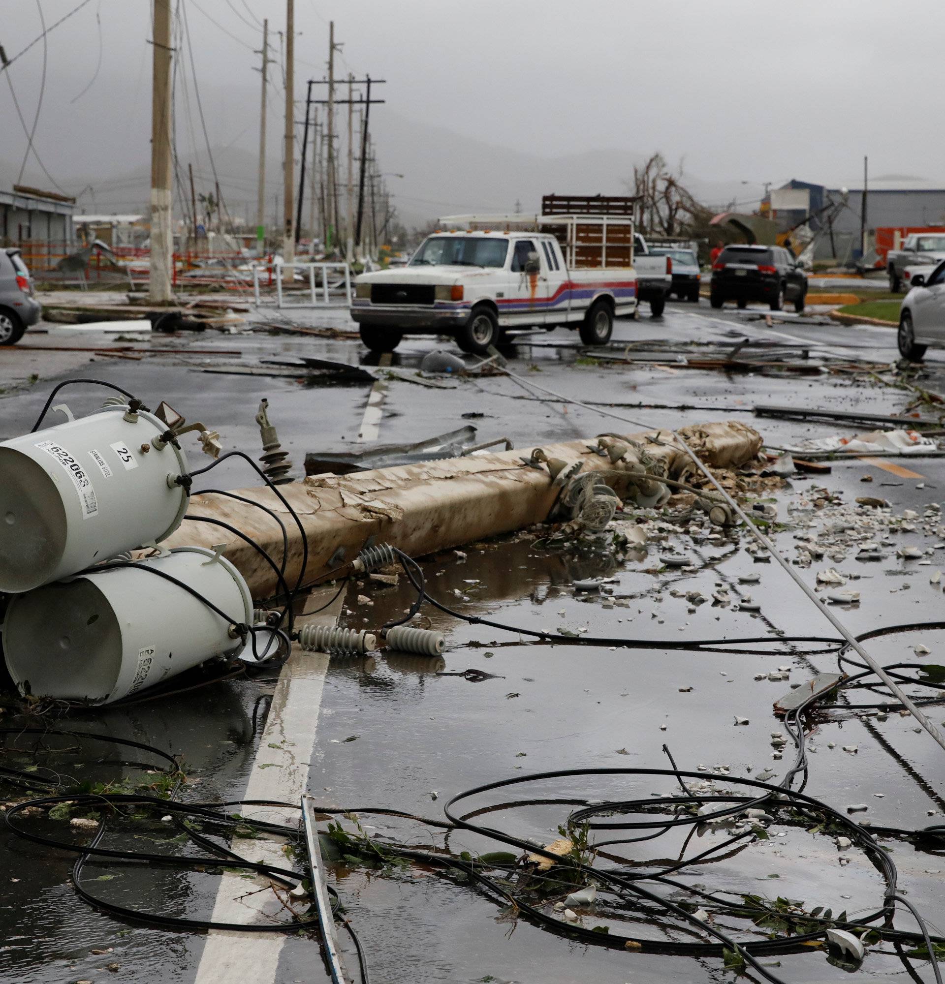 Damaged electrical installations are seen after the area was hit by Hurricane Maria en Guayama