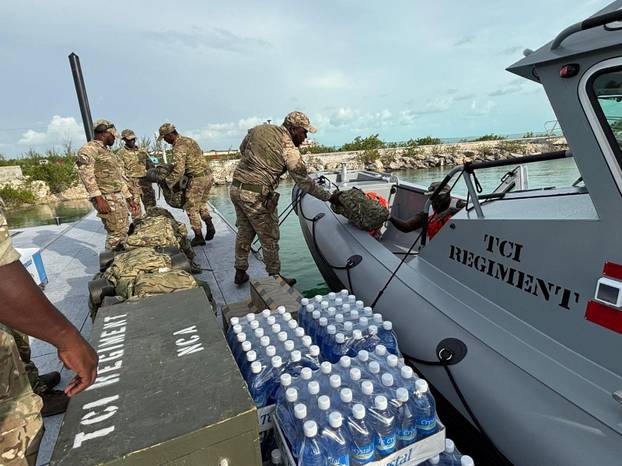 Troops of the TCI Regiment prepare to support humanitarian assistance and disaster relief operations following Hurricane Erin, in Turks and Caicos islands