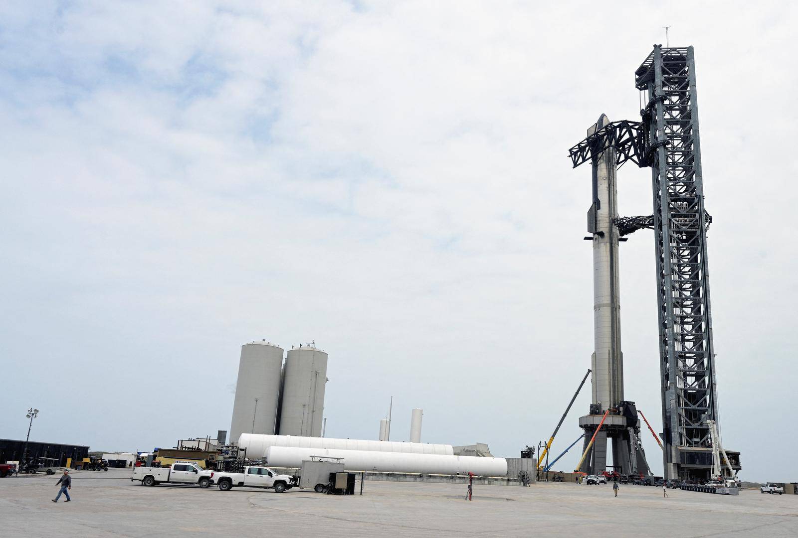 Crews prepare for the launch of the SpaceX Starship, near Brownsville