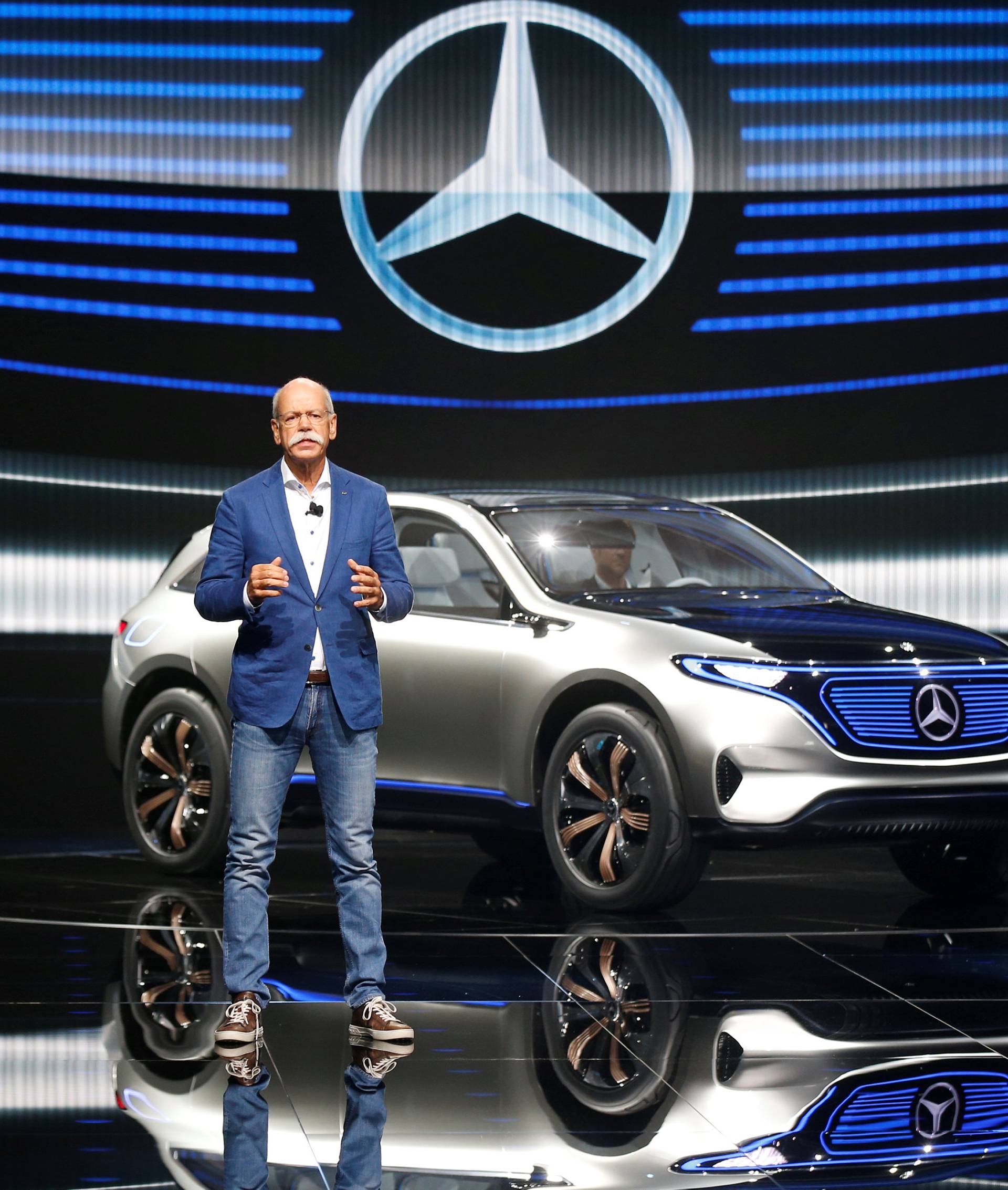 Dieter Zetsche, CEO of Daimler and Head of Mercedes-Benz, attends a news conference in front of a Mercedes EQ Electric car on media day at the Mondial de l'Automobile in Paris