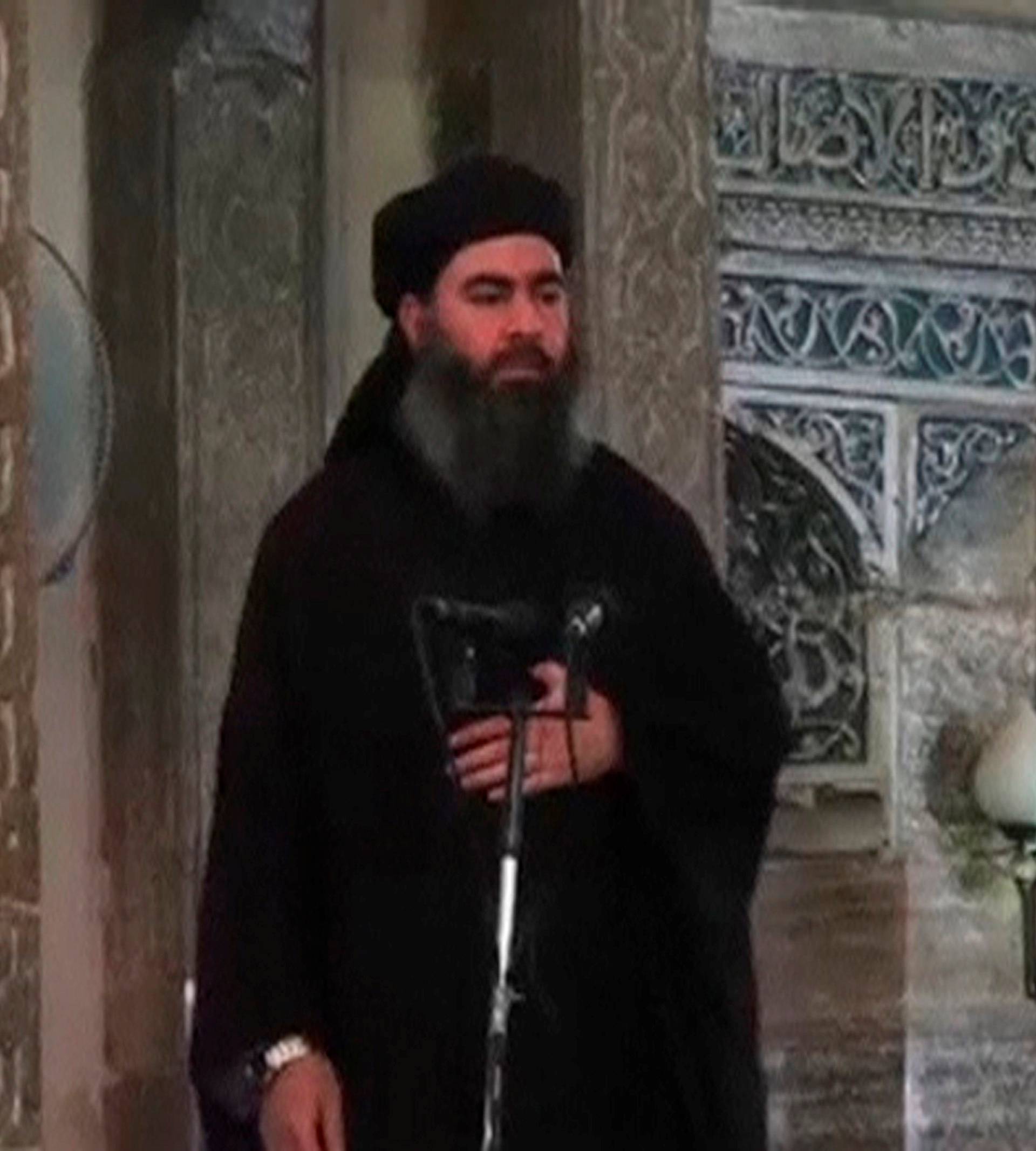 FILE PHOTO: Still image taken from video of a man purported to be the reclusive leader of the militant Islamic State Abu Bakr al-Baghdadi making what would be his first public appearance at a mosque in Mosul