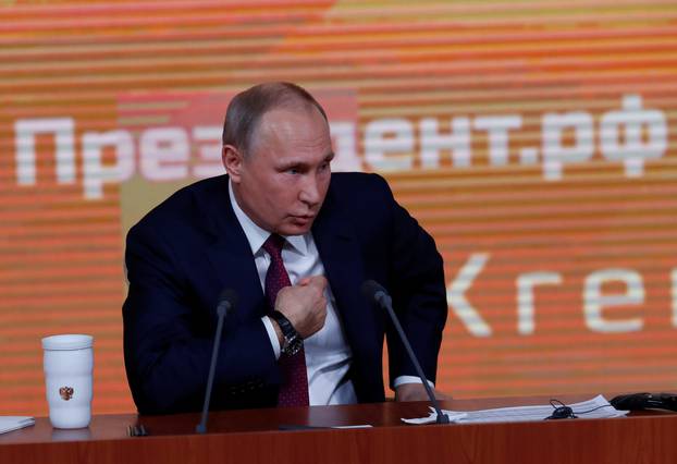 Russian President Vladimir Putin speaks during his annual end-of-year news conference in Moscow