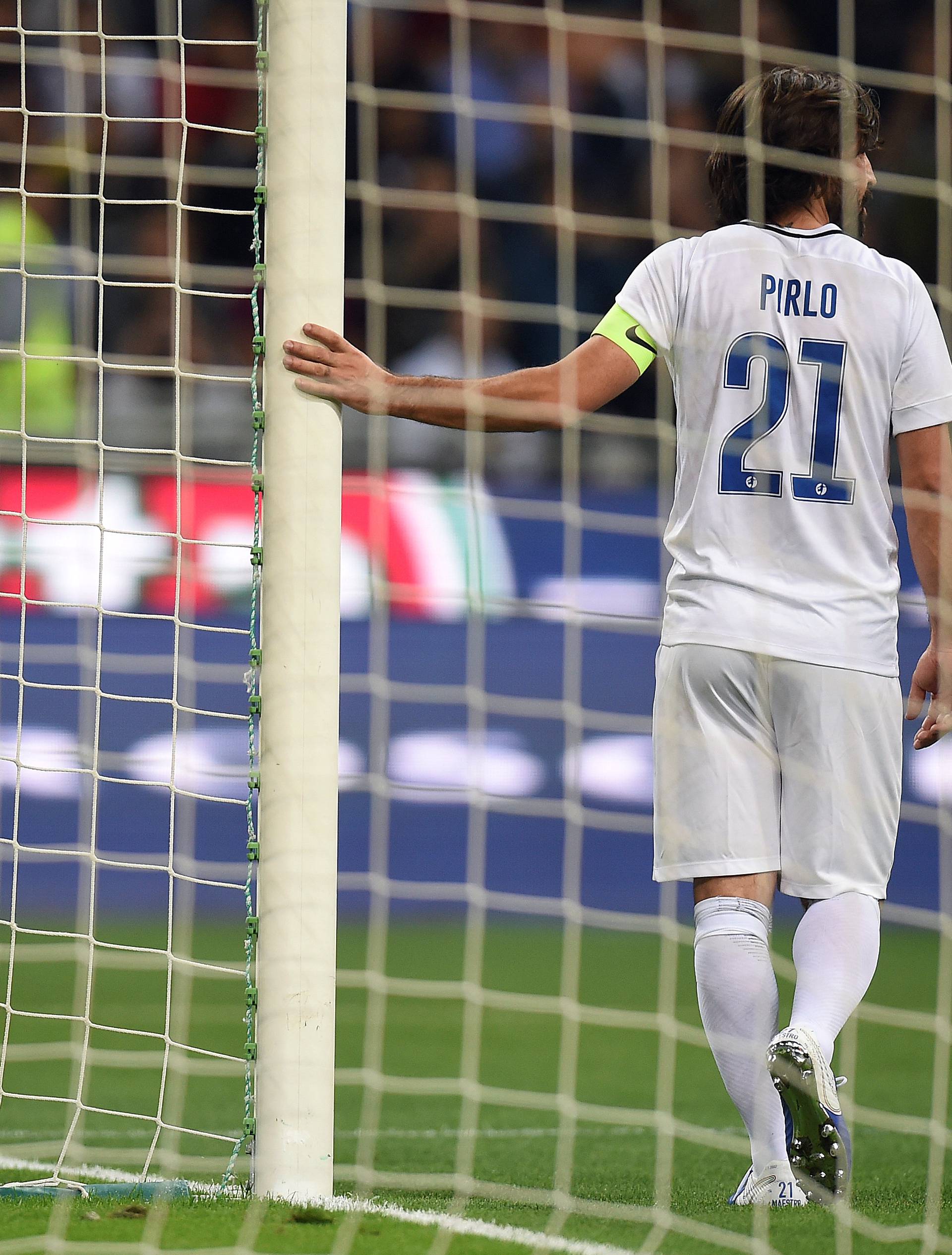 Former Italian soccer player Andrea Pirlo looks on during his farewell soccer match at the San Siro stadium in Milan