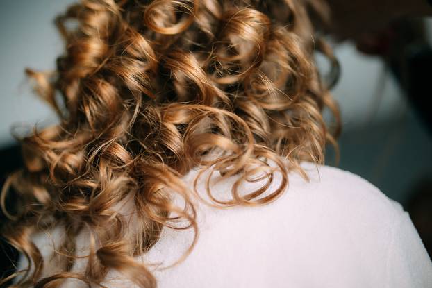 Woman's hair, curls close-up