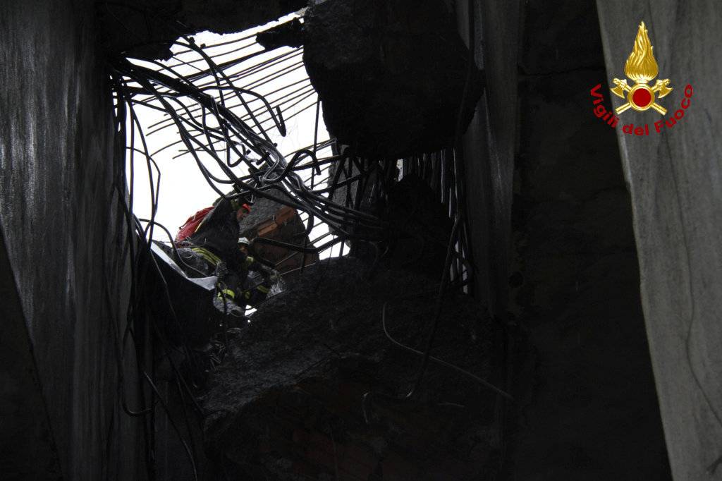 The collapsed Morandi Bridge is seen in the Italian port city of Genoa in this picture released by Italian firefighters