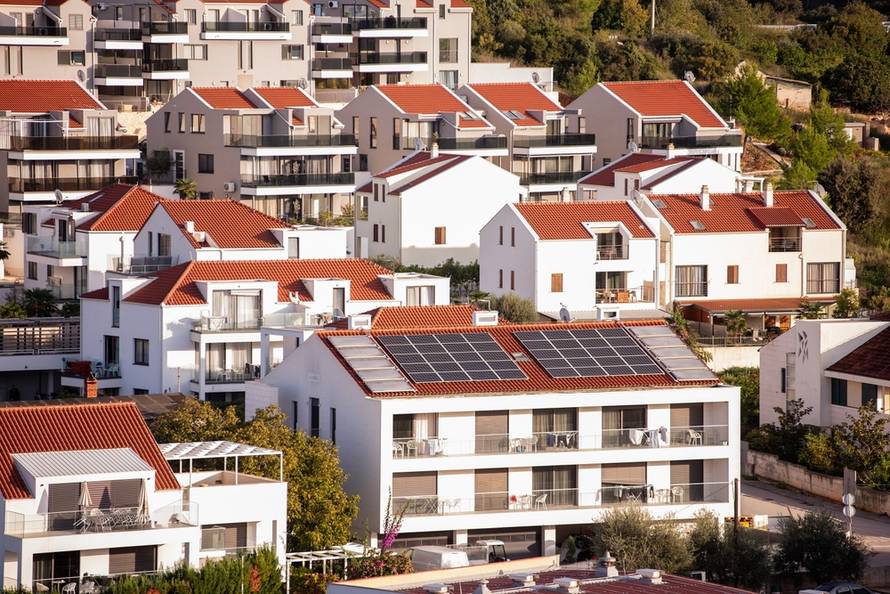 Cluster,Of,Modern,Residential,Buildings,Featuring,Red-tiled,Roofs,,Some,Equipped