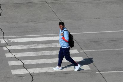 FOTO Vatreni izazvali euforiju na aerodromu: Djeca pohrlila do Modrića i Gvardiola...