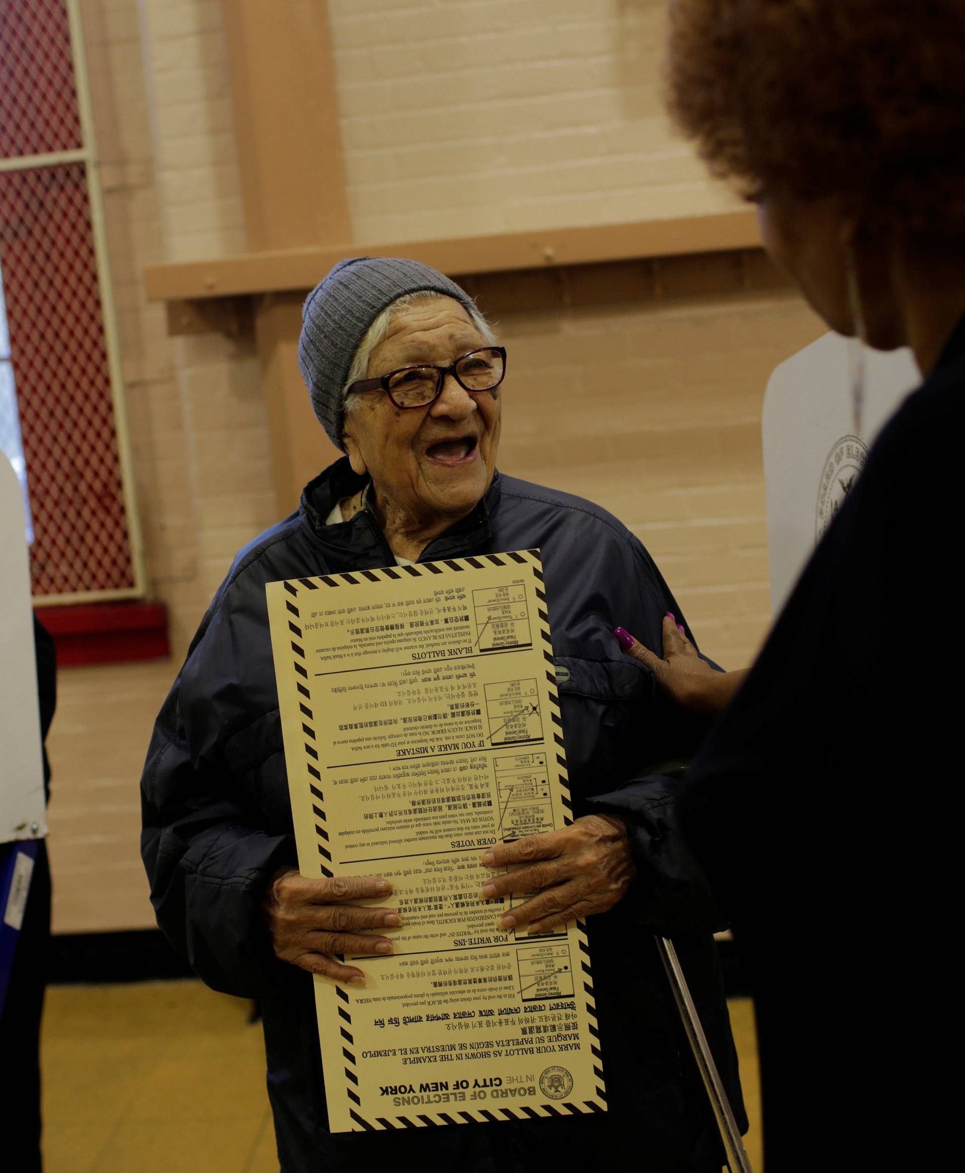 Teresa Lesama, originally from Nicaragua, is seen after casting her ballot during the U.S. presidential election at a polling station in the Bronx Borough of New York