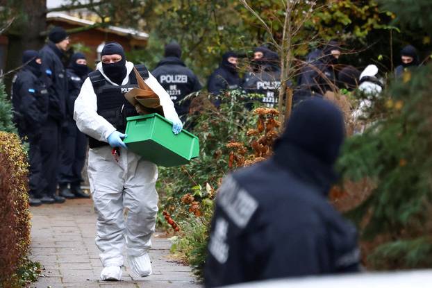 Suspected members and supporters of a far-right group were detained during raids, in Berlin