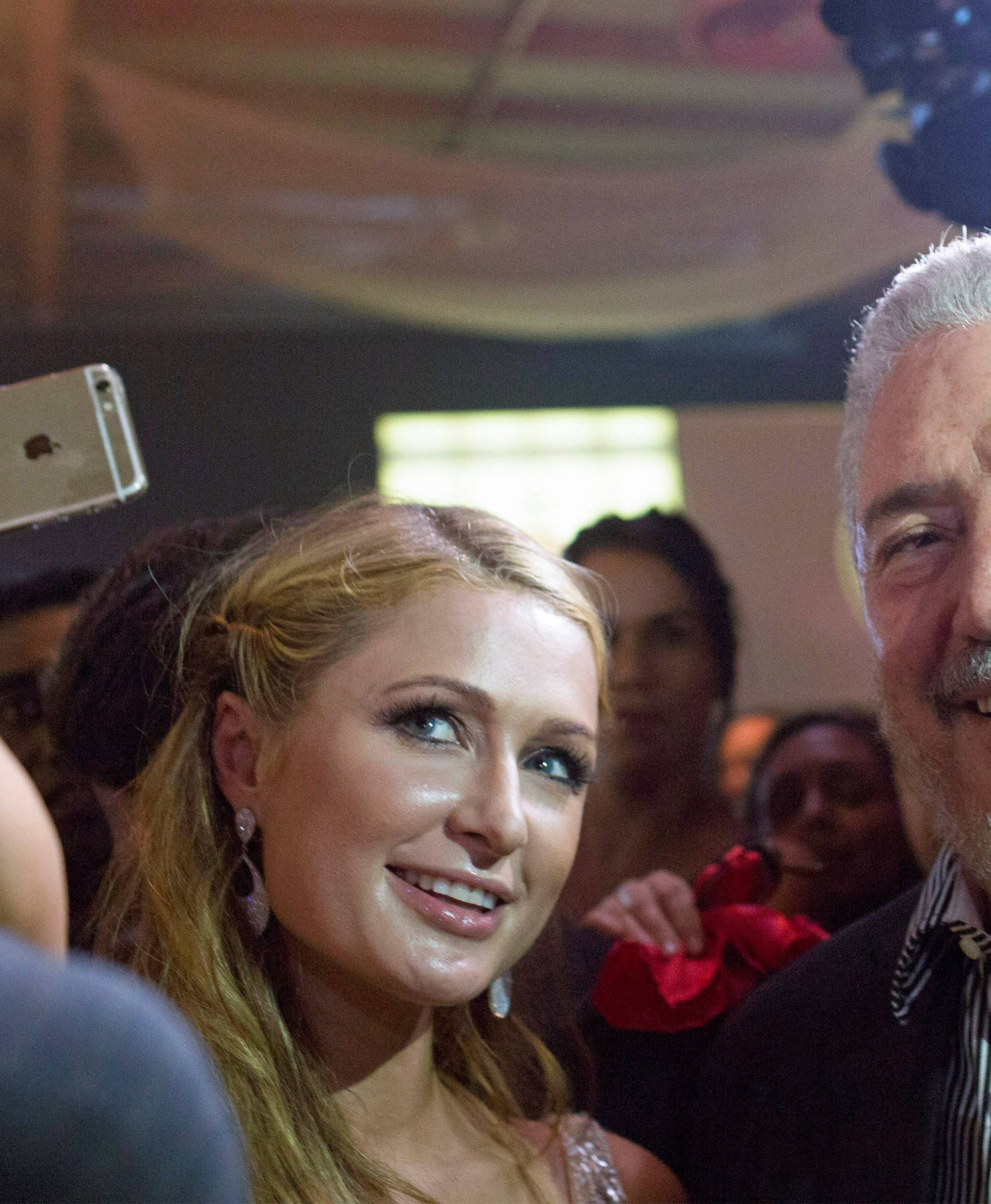 FILE PHOTO: Fidel Castro Diaz-Balart poses with Hilton during the gala dinner of the XVII Habanos Festival, in Havana