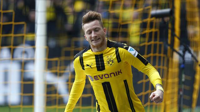 Borussia Dortmund's Marco Reus celebrates scoring their first goal