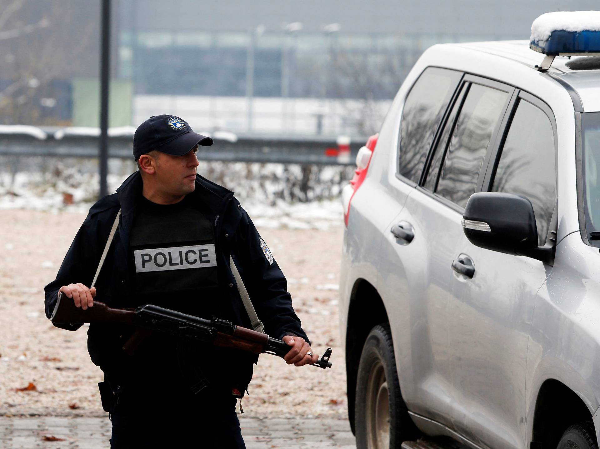 Kosovo police officers patrol in North Mitrovica