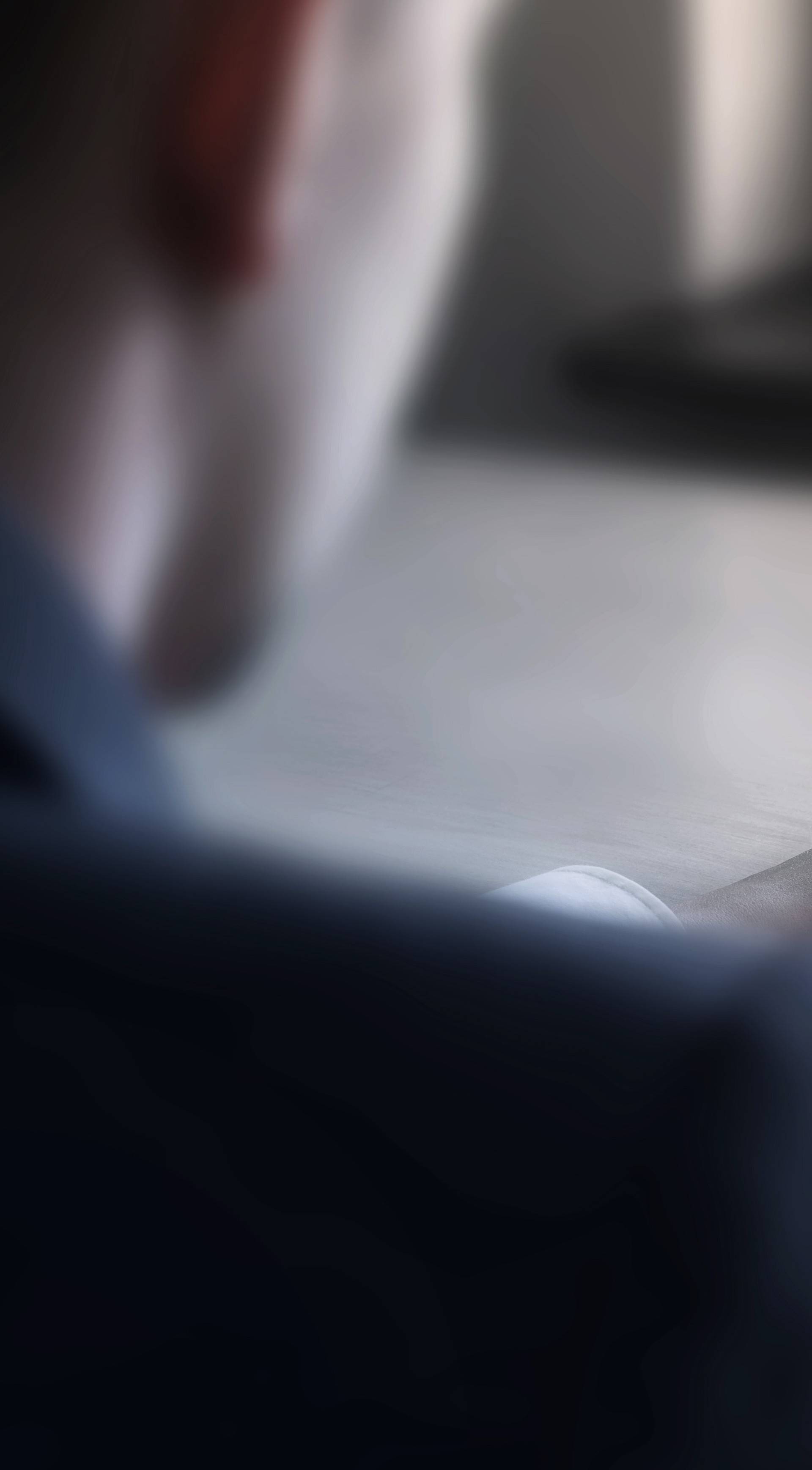 Businessman working on the laptop with blank screen