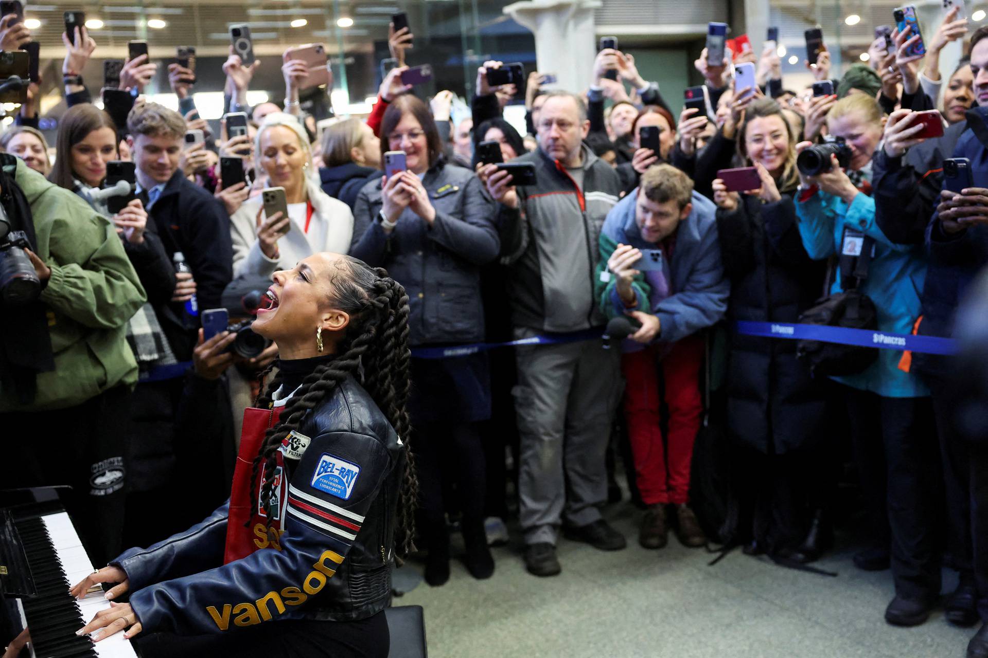 Singer Alicia Keys performs at St. Pancras International Station in London