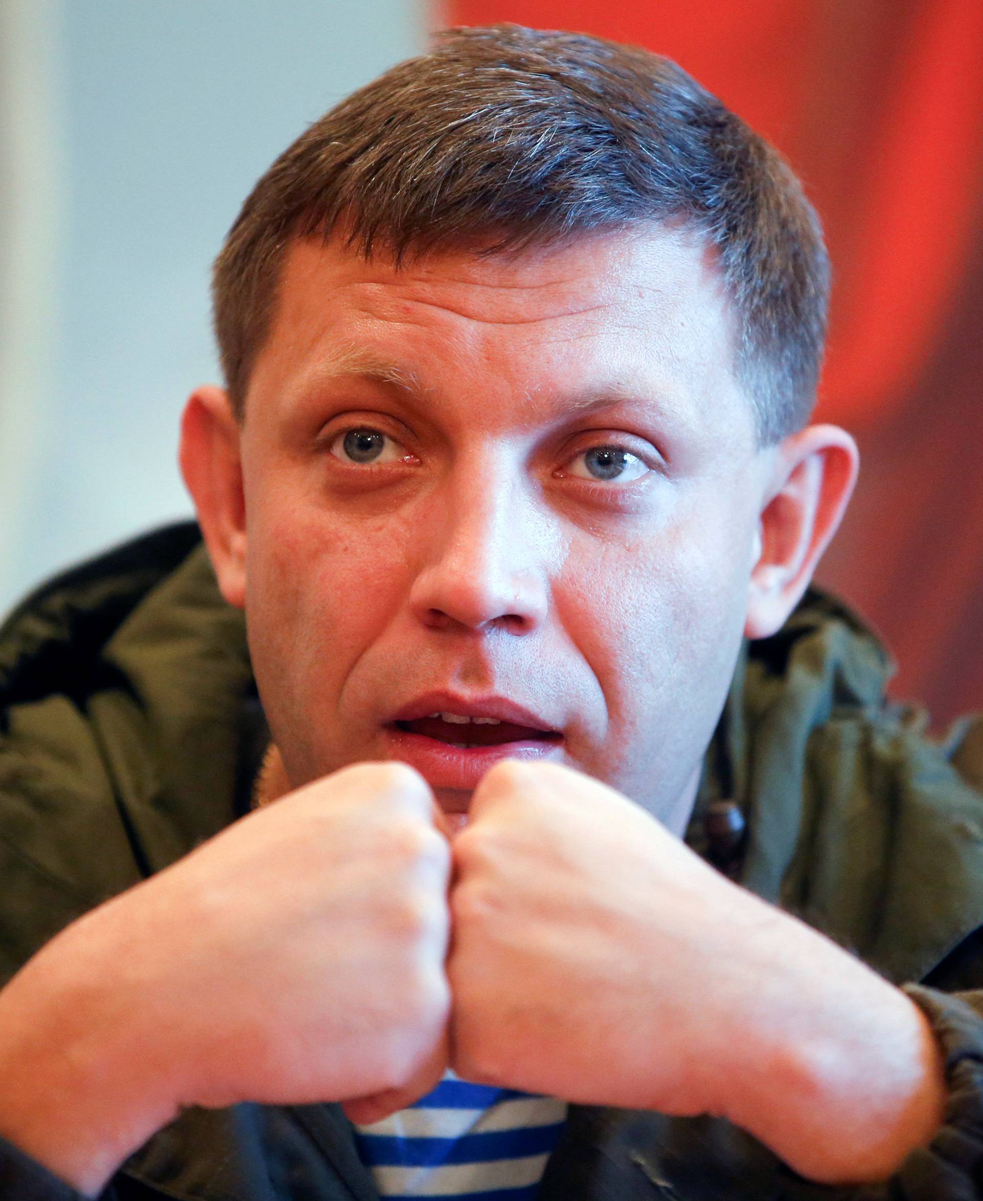 FILE PHOTO: Zakharchenko, separatist leader of the self-proclaimed Donetsk People's Republic, speaks to the media during a visit to Makeevskiy coking plant in Makiivka