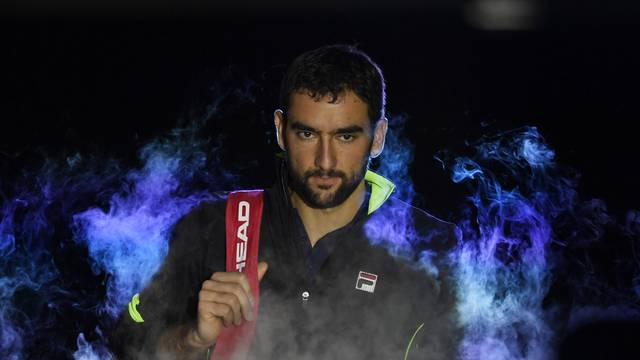 Croatia's Marin Cilic makes his entrance before his round robin match against Great Britain's Andy Murray