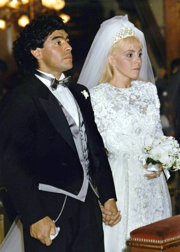 FILE PHOTO: Soccer legend Maradona and wife Claudia
