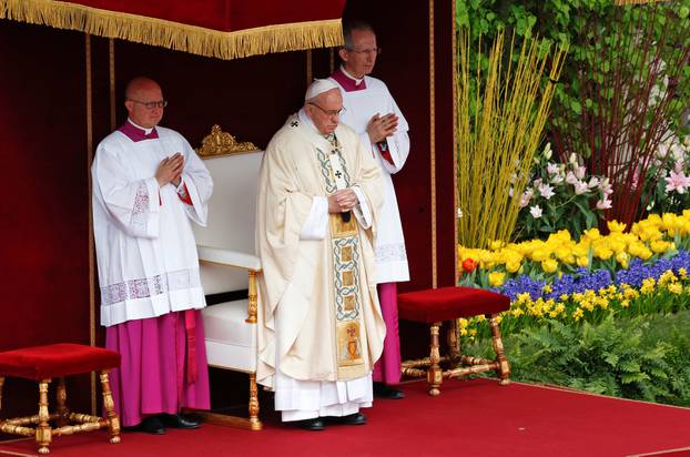Pope Francis leads the Easter mass in Saint Peter