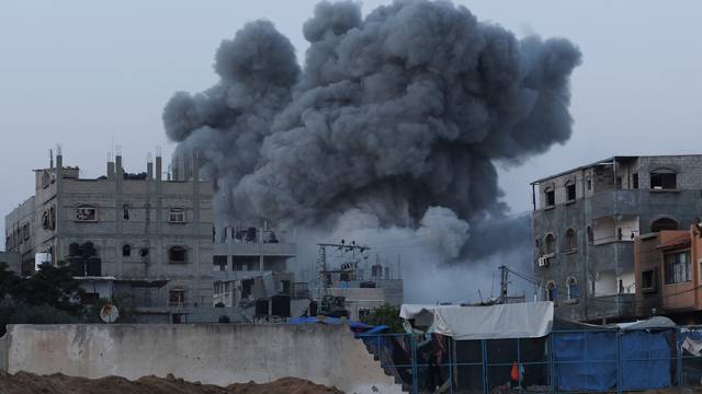 Smoke rises during an Israeli air strike in central Gaza Strip