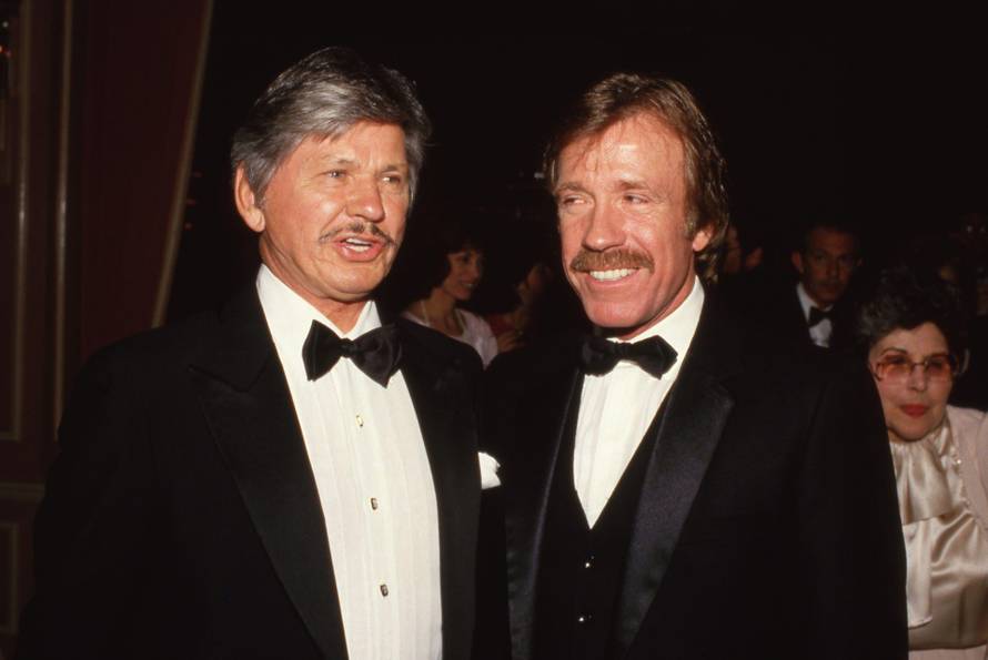 **FILE PHOTO** Chuck Norris Has Passed Away. Charles Bronson and Chuck Norris Circa 1980's Credit: Ralph Dominguez/MediaPunch