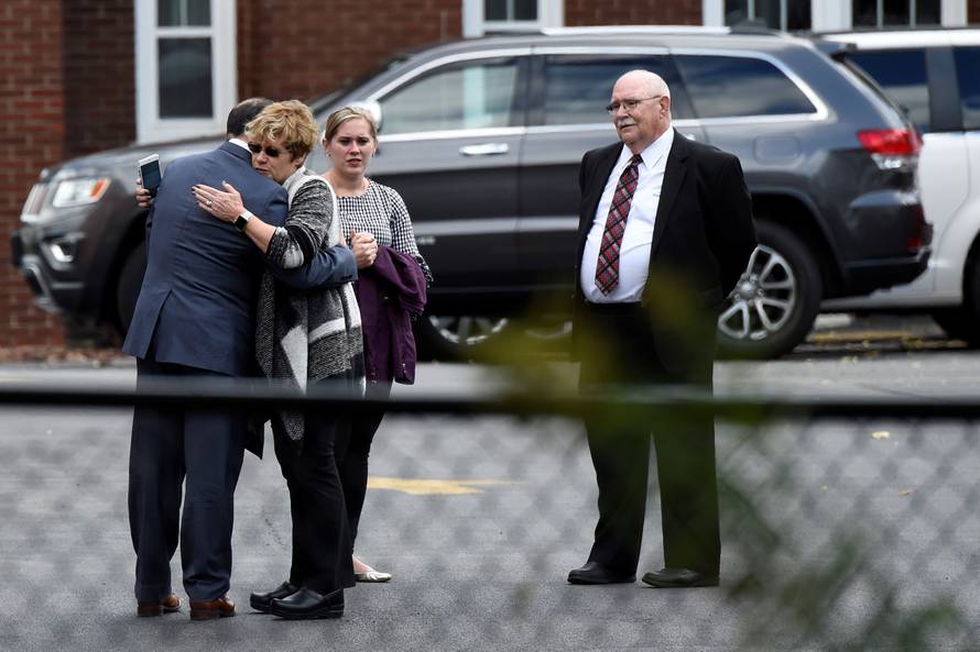 Mourners attend a combined wake for the victims Saturday's limousine crash in Amsterdam