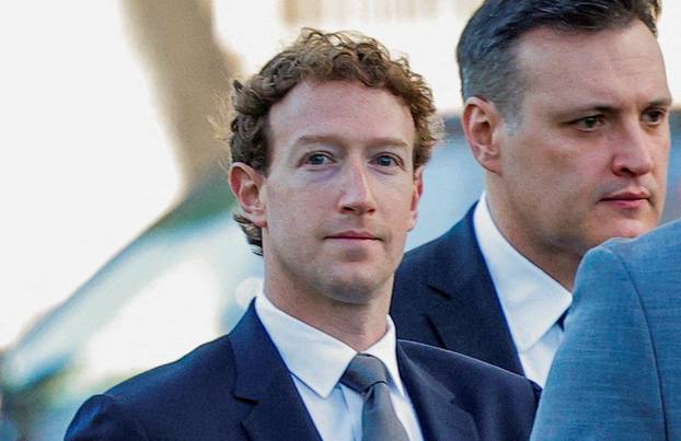 Meta Platforms CEO Mark Zuckerberg arrives outside court to take the stand at trial, in Los Angeles