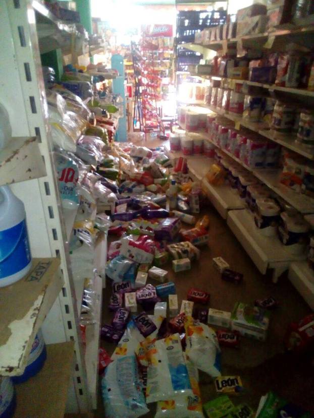 Fallen merchandise is seen on the floor after an earthquake in Oaxaca