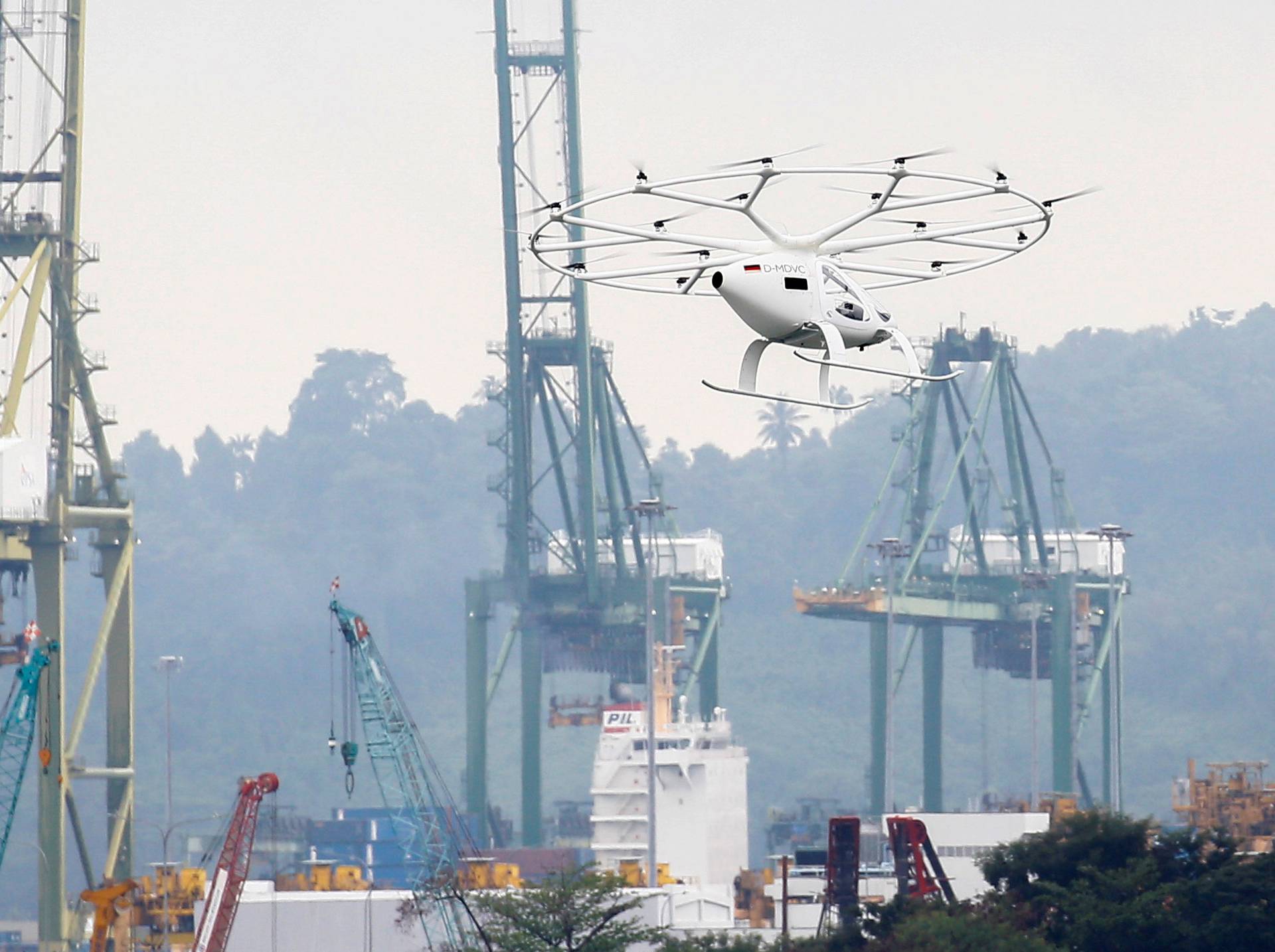 A Volocopter air taxi performs a demonstration in Singapore