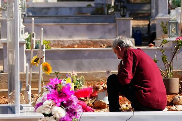 David Hunter lays flowers at the grave of his wife Janice Hunter at a cemetery near their their former home in Paphos, Cyprus. Picture date: Tuesday August 1, 2023.